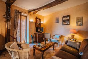 Maisons de vacances Maison en pierre avec bassin : photos des chambres