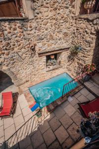 Maisons de vacances Maison en pierre avec bassin : Maison 2 Chambres
