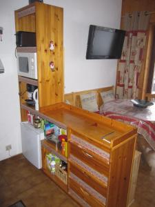 Appartements F2 Grand Confort en face du telecabine : photos des chambres