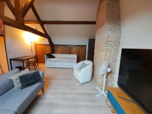 Maisons de vacances Les Anciennes ecuries du Chateau : photos des chambres
