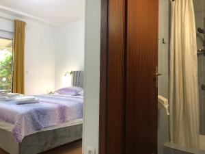 Double room with bathroom, beach close, kitchen use