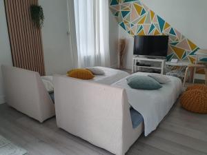 Appartements Appartement Duplex : photos des chambres