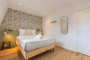 Maisons de vacances Maison 3 chambres avec jardin, proche tram : photos des chambres