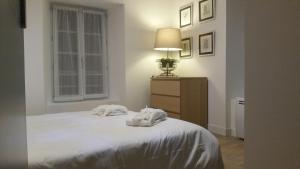 Appartements Le Clos St Louis : photos des chambres