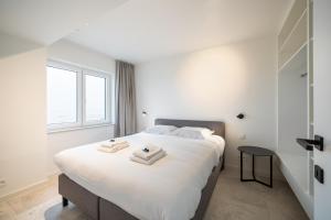 Beachfront Luxe - Stijlvol app met frontaal zeezicht