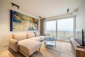 Beachfront Luxe - Stijlvol app met frontaal zeezicht