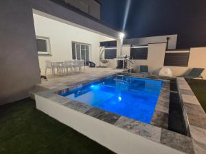 Appartements Appartement avec Jacuzzi Sauna : photos des chambres