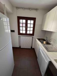 Casa di fronte alle piste da sci campo da golf