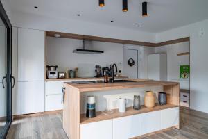 Maisons de vacances Ecolodge 4etoiles Luxe, detente et balneo dans la foret : photos des chambres