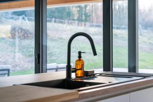 Maisons de vacances Ecolodge 4etoiles Luxe, detente et balneo dans la foret : photos des chambres