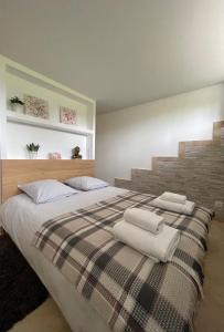 Appartements Duplex independant avec clim et parking : photos des chambres