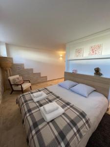 Appartements Duplex independant avec clim et parking : photos des chambres