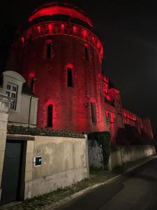 Appartements Les pieds dans le Chateau - Jacuzzi : photos des chambres