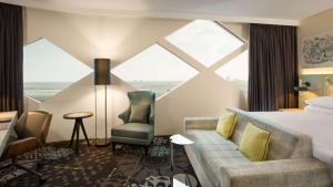 King Deluxe Corner Room with Airport View room in Hilton Amsterdam Airport Schiphol