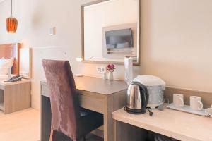 Good Place Studio at Grand Palace Kemayoran Apartment By Travelio