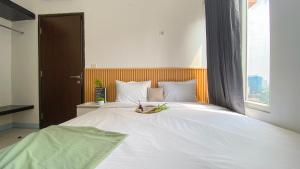 Best Place and Nice 1BR at Boutique Kemayoran Apartment By Travelio