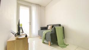 Brand New and Homey 1BR at Boutique Kemayoran Apartment By Travelio