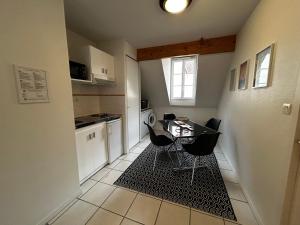 Appartements Studio a 200m des thermes avec piscine, parking et WiFi - FR-1-541-112 : photos des chambres