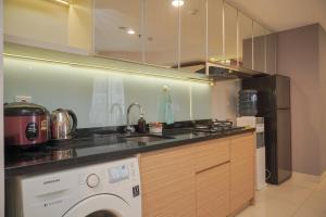 Modern and Comfort 2BR at The Mansion Kemayoran Apartment By Travelio