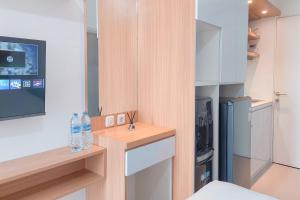 Good Place Studio at Urbantown Serpong Apartment By Travelio