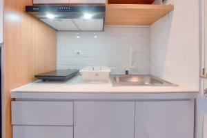 Good Place Studio at Urbantown Serpong Apartment By Travelio