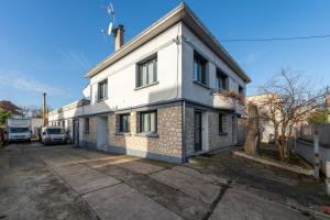 Maisons de vacances Les Coteaux 1 - Proche de Paris CDG : photos des chambres