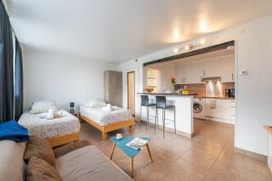 Appartements Les Coteaux 3 - Studio a 10min de Paris : photos des chambres