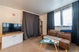 Appartements Les Coteaux 3 - Studio a 10min de Paris : photos des chambres