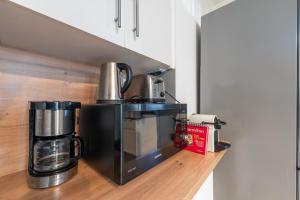 Appartements Les Coteaux 3 - Studio a 10min de Paris : photos des chambres