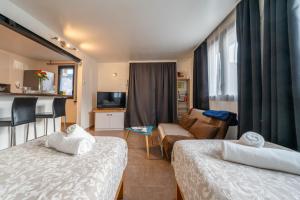 Appartements Les Coteaux 3 - Studio a 10min de Paris : photos des chambres