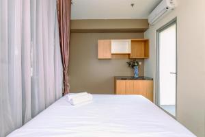 Comfortable and Tidy Studio at Titanium Square Apartment By Travelio