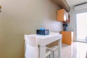 Comfortable and Tidy Studio at Titanium Square Apartment By Travelio