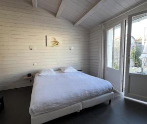 Maisons de vacances RIVAGE Maison spacieuse avec piscine et spa : photos des chambres