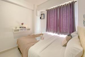 Good Choice and Homey 2BR at Bassura City Apartment By Travelio