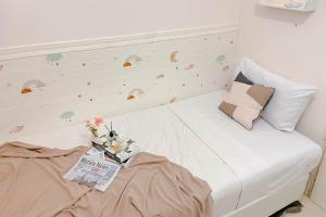 Good Choice and Homey 2BR at Bassura City Apartment By Travelio