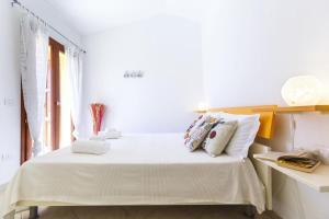 Villa Mama con piscina condominiale, giardino e barbecue