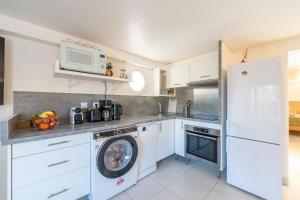 Appartements Les Coteaux 5 - Appt avec jardin a Argenteuil : photos des chambres