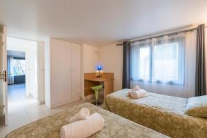 Appartements Les Coteaux 5 - Appt avec jardin a Argenteuil : photos des chambres