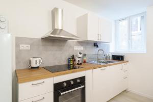 Appartements La Suite du Chateau B - En plein centre : photos des chambres