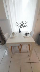 Appartements Studio RDC l-Auron- wifi - cour : photos des chambres