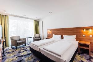Double Room with Lake View room in Vitalia Seehotel