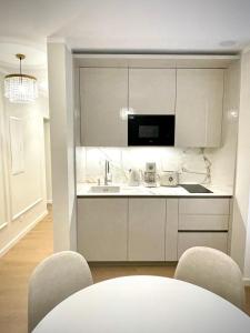Appartements Elegant Apartment Near the European Quarter : photos des chambres