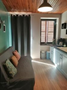Appartements Une evasion dans les Pierres Dorees : photos des chambres