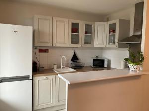 Appartements Appartement avec parking & linge inclus & local velos : photos des chambres