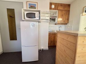 Appartements Studio cosy au pied des pistes avec piscine et parking - 4 pers - FR-1-595-19 : photos des chambres