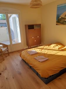 Maisons de vacances Charming house near village with 5-minutes pedestrian access to old town : photos des chambres