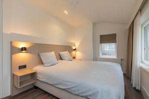 Welcome in - Vakantiewoningen in het centrum met balkon - Langstraat 5 Zoutelande