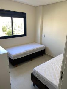 Apto 3 quartos a 70 metros da praia de Palmas SC