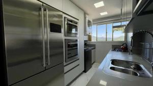 Apto Alto Padrão, vista panorâmica para toda a orla e mar, 2Q, 1 vaga