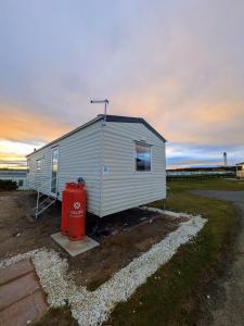 Aurora on the Dunes- Cozy Coastal Retreat with Scenic Views